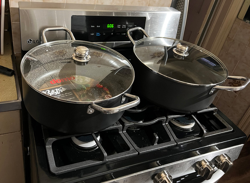 Two large pots on a stove